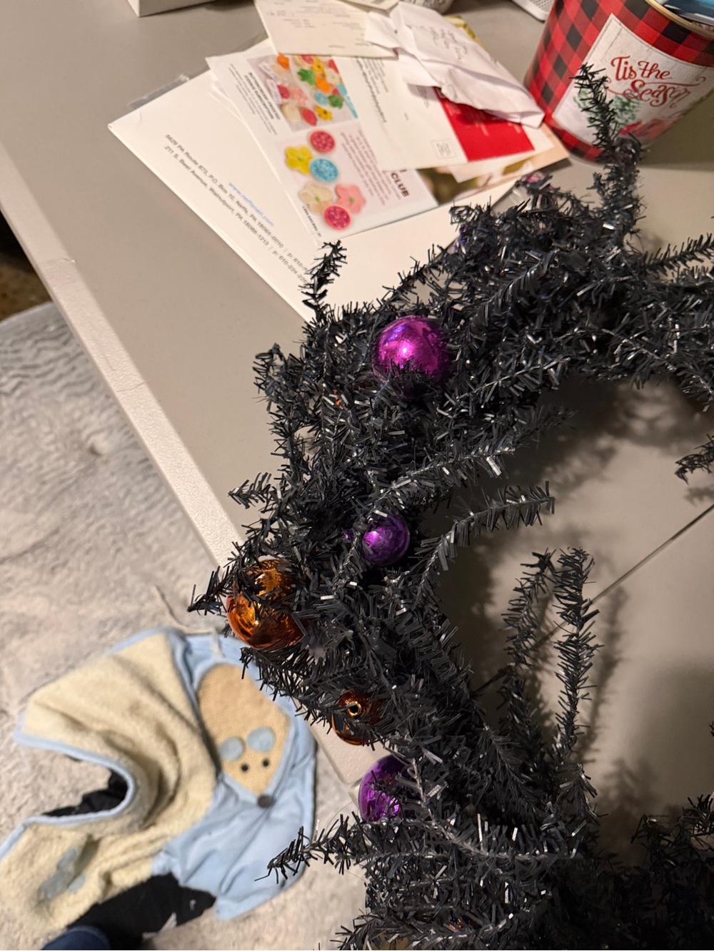 Black Holiday Tinsel Garland with Purple and Orange Ornaments